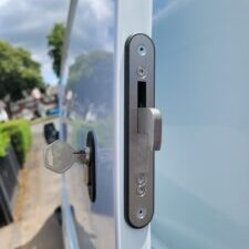 Hook Lock Wirral Hook Lock on the sliding door of a white Ford Transit Custom Van.